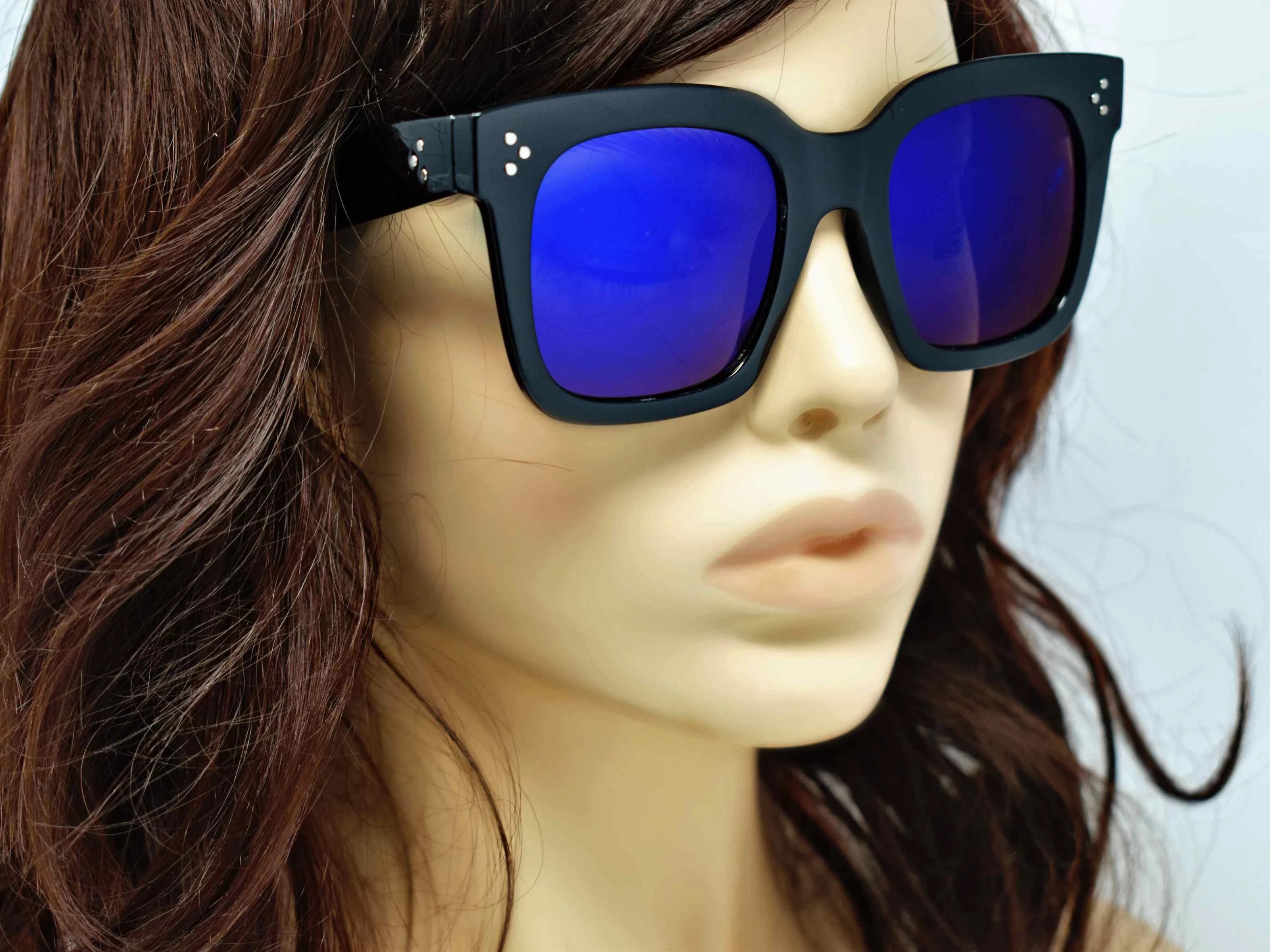 Cool and Classic you can always depend on our Amaranth Black framed sunglasses with a two toned blue mirrored lens in a wayfarer shape.