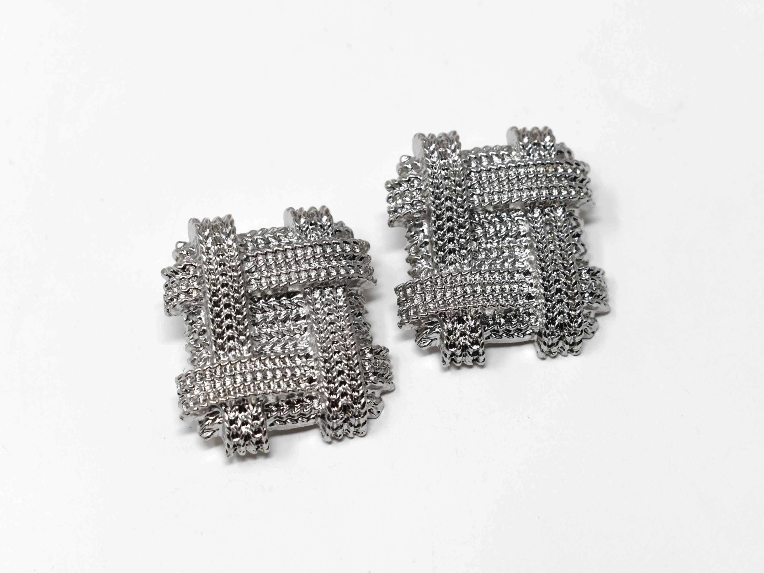 Our Ane silver earrings Chic design will showcase your standout style with its unique chain design. These oversized square knobs 1 1/2" in length with a clip back clasp. All hail the clip ons!