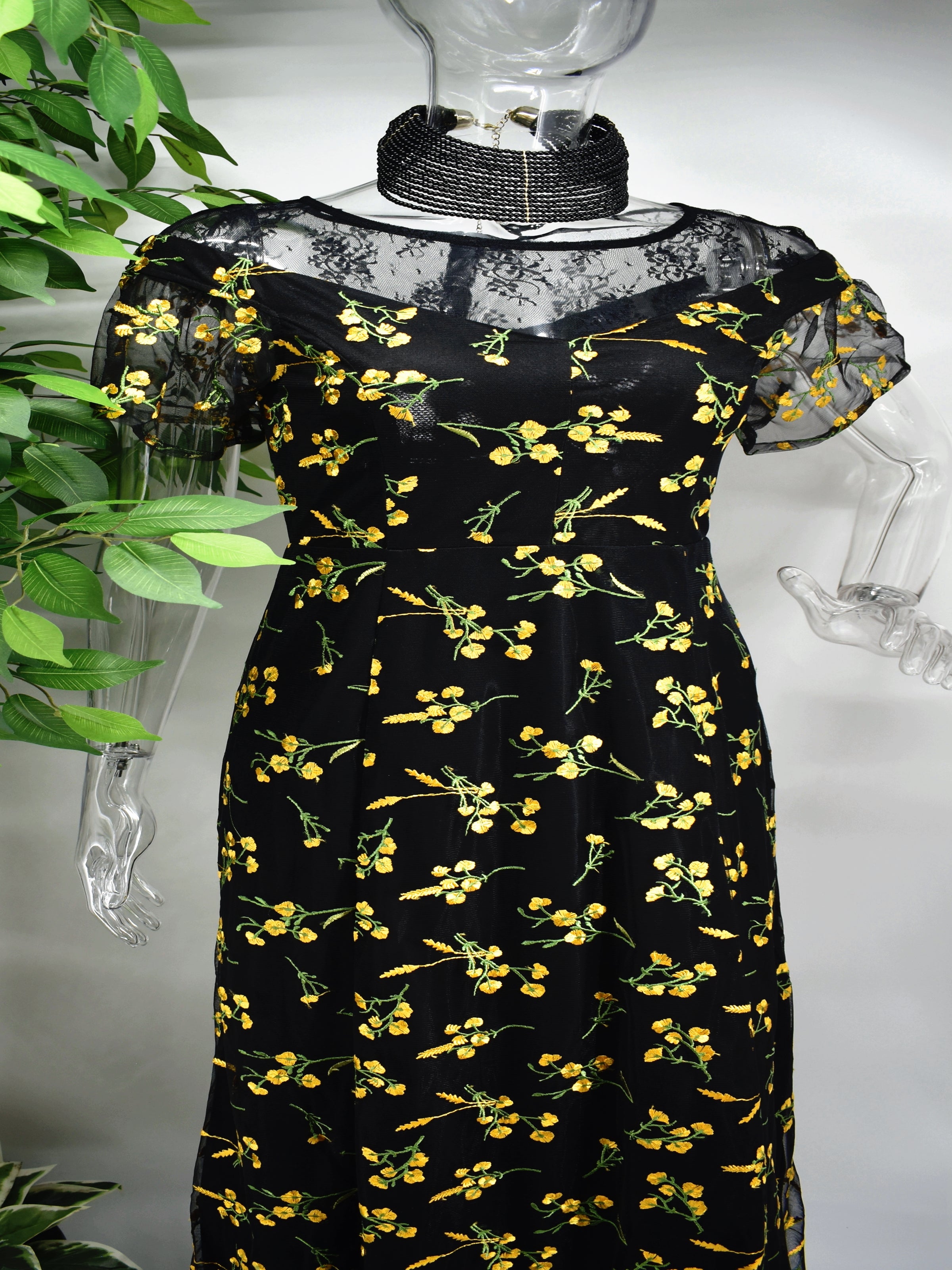 Our Beryle maxi black floral dress is a modern take on a classic silhouette. 