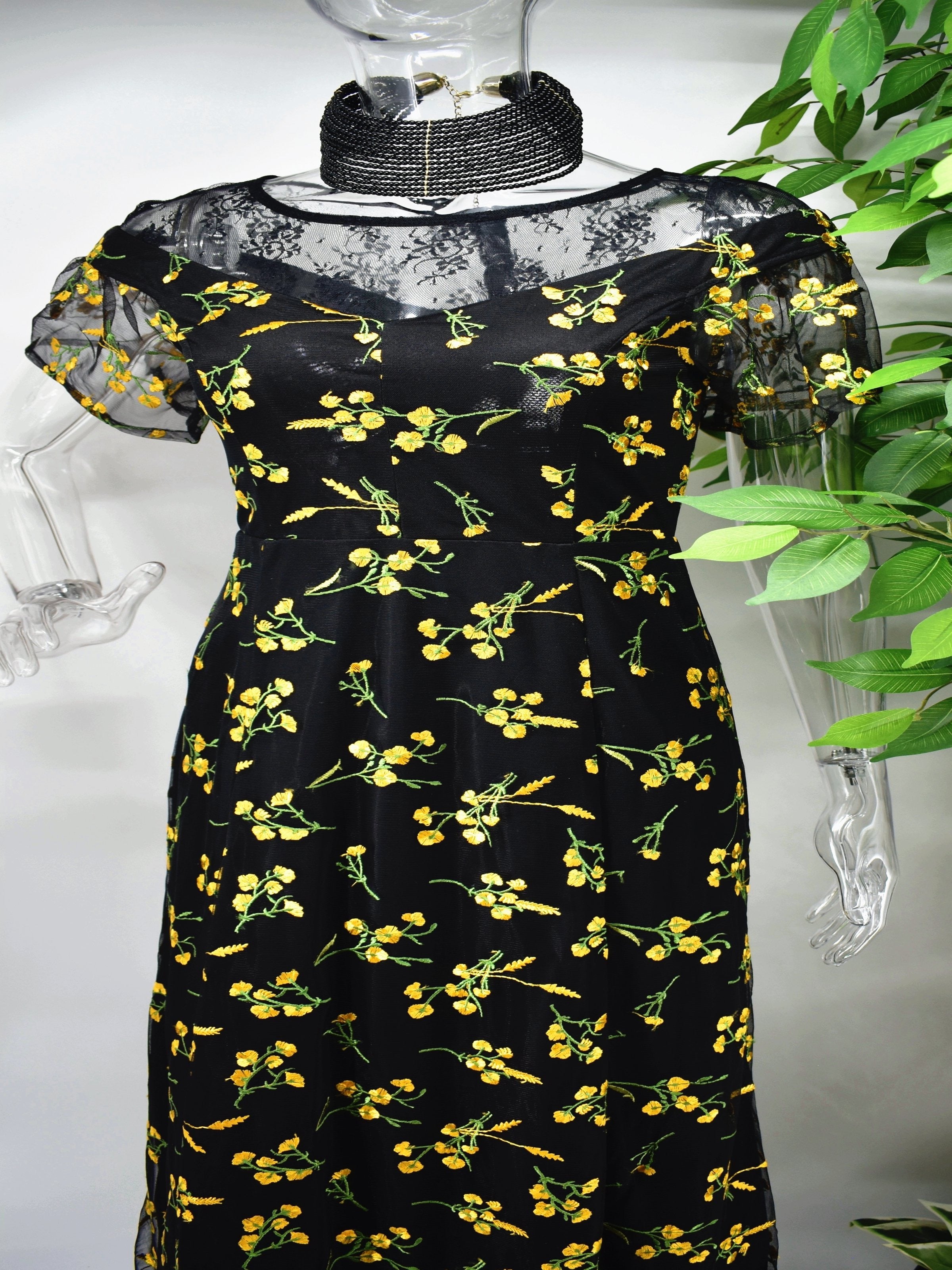 Our Beryle maxi black floral dress is a modern take on a classic silhouette. 