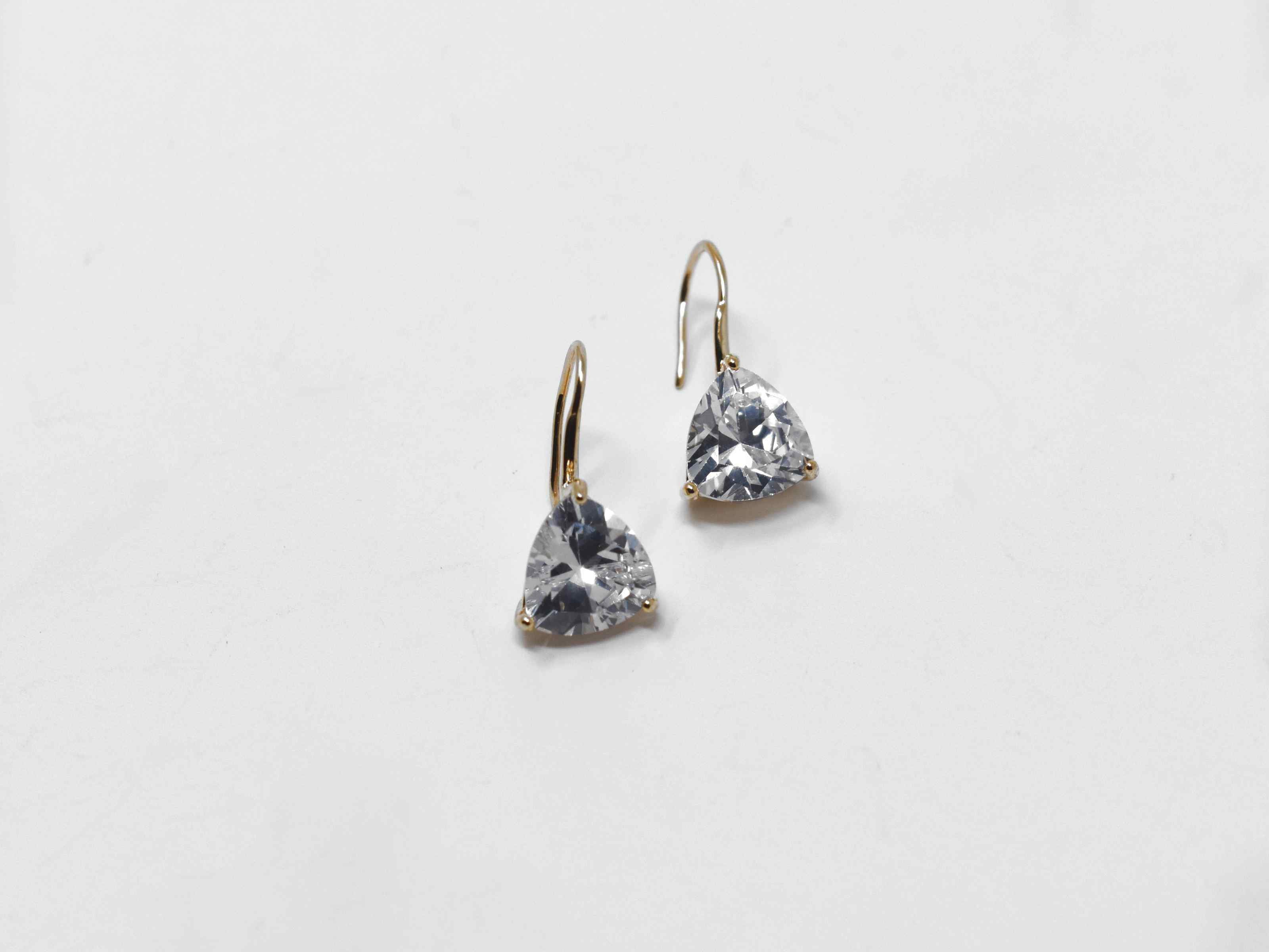 Our bluebell is a beautiful delicate chandelier knob earring. These earrings are a gold drop dangle earring with a fish hook clasp. They are 3/4 of an inch in length.