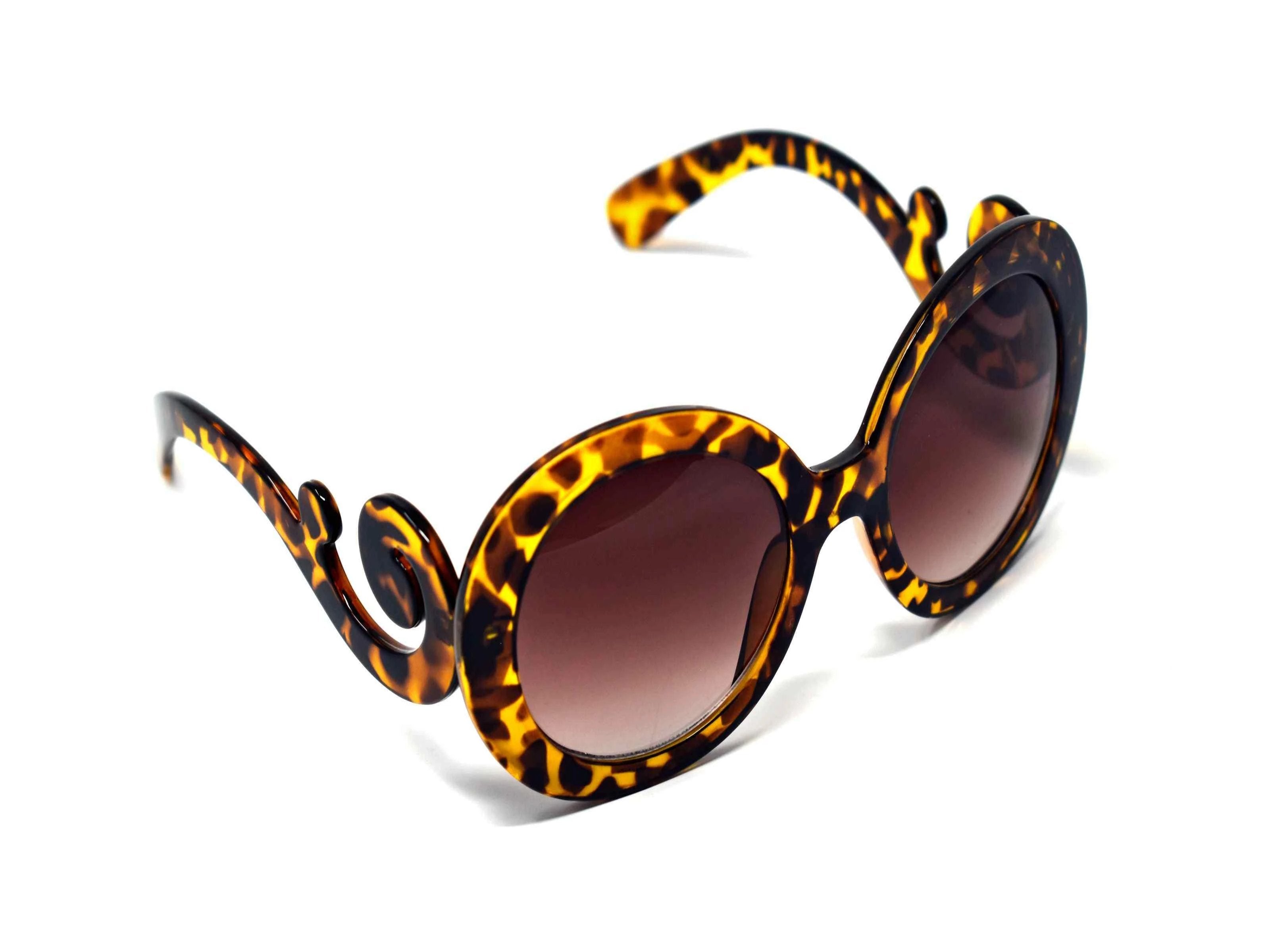 Be prepared to add our Clover leopard tortoise frame glasses with swirl handle and a brown lens to your top 10 go too favs.
