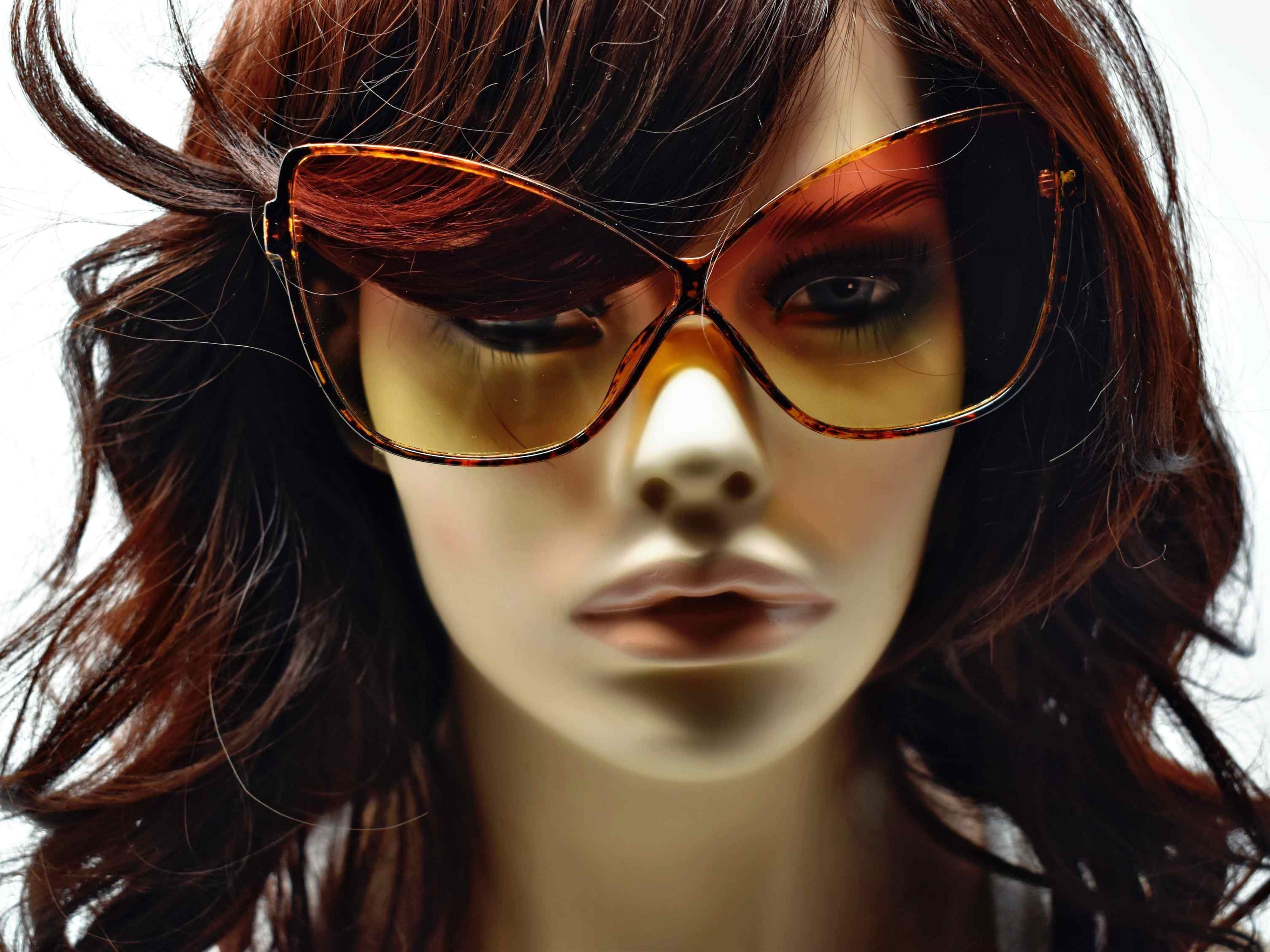 Our dahlia leopard tortoise cat eye frame with a orange to yellow ombre lens should be considered a no brainer when adding a touch of eye catching style.