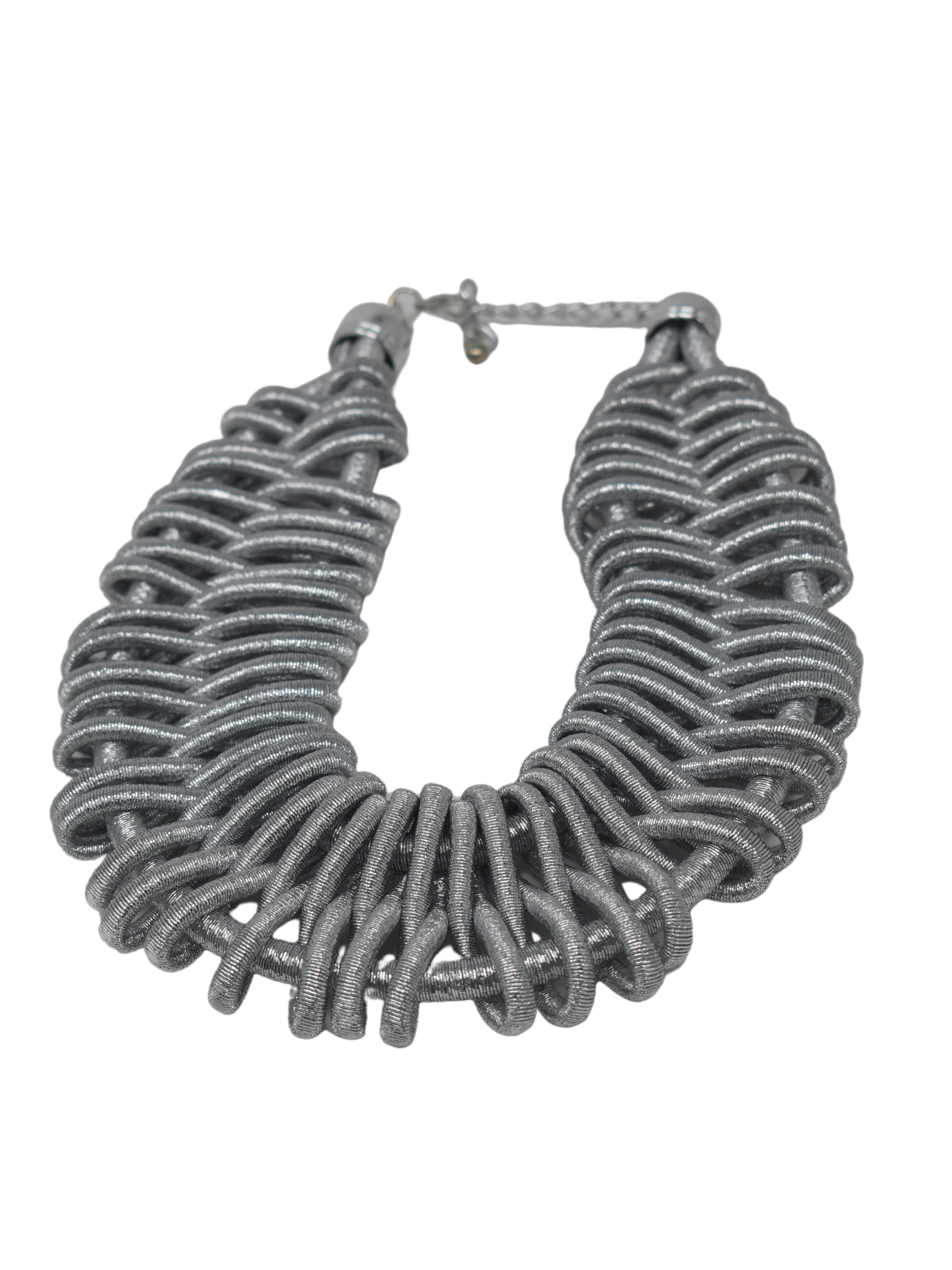 Charming and Chic, our Haven Necklace will have you looking picture perfect! Haven is a bib style necklace that is silver in tone. It is wrapped in in a  braided glitzy silver rope to form havens unique design.