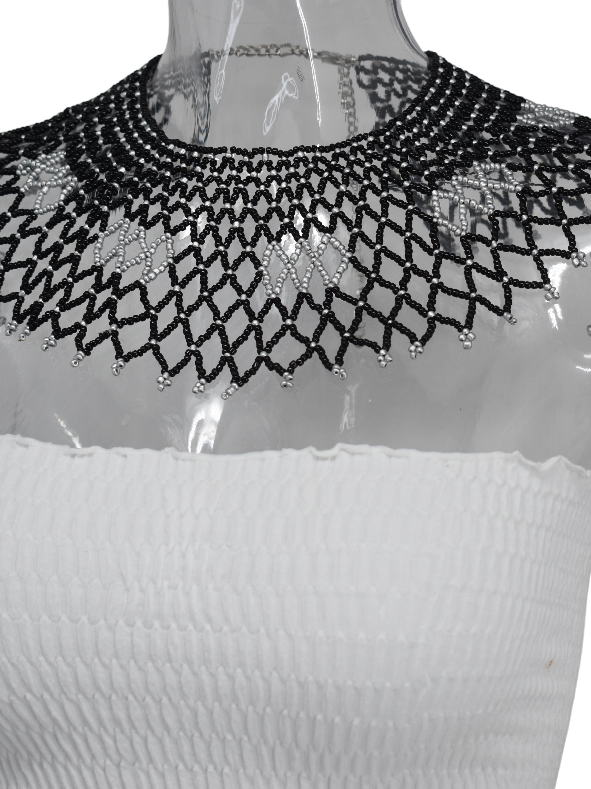 Our Nicola black and silver dainty bib styled necklace will have you feeling like royalty on any given day of the week.