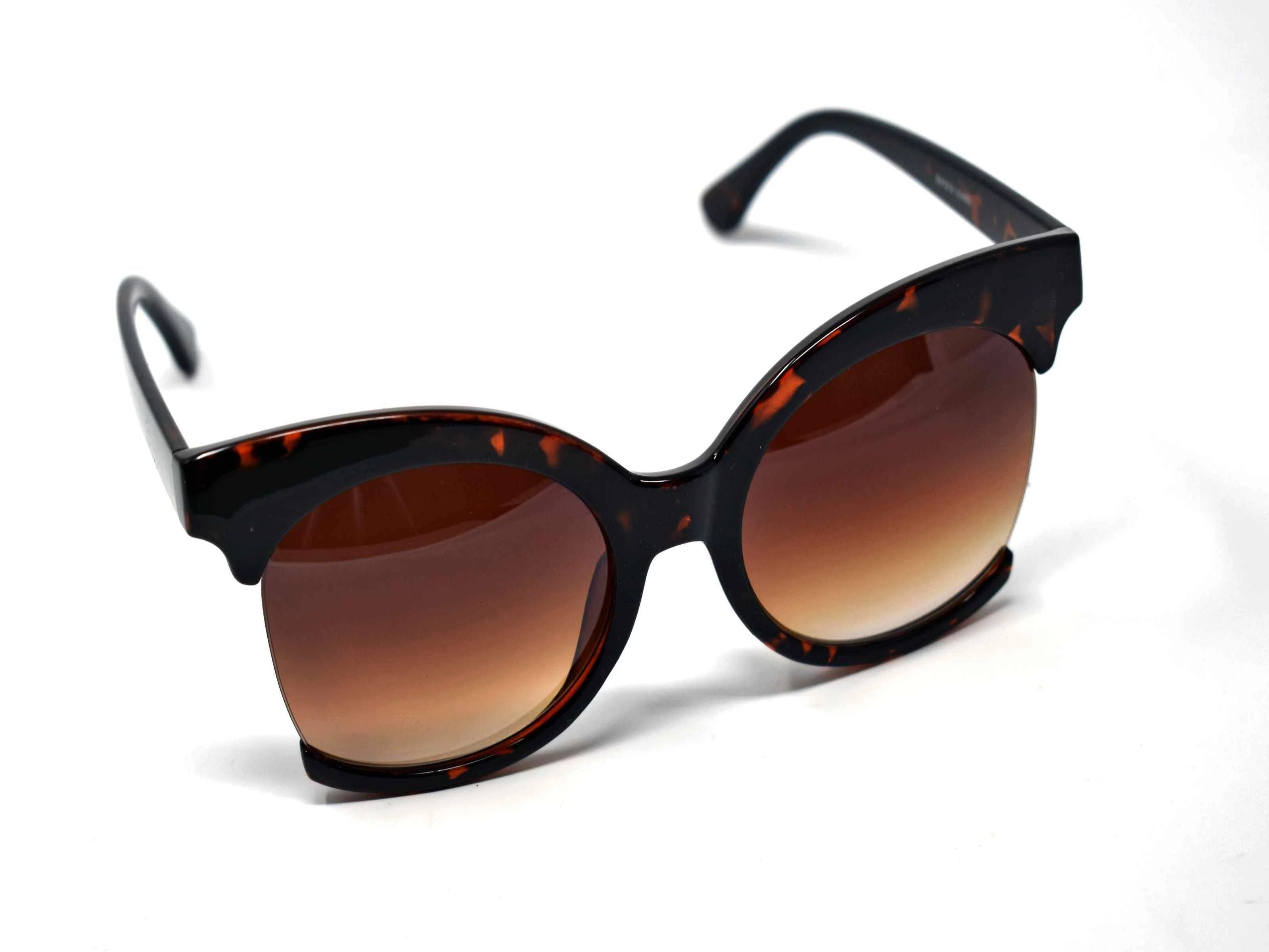 Be bold in our cutting edge primrose leopard tortoise cut out frames with a brown lens. 