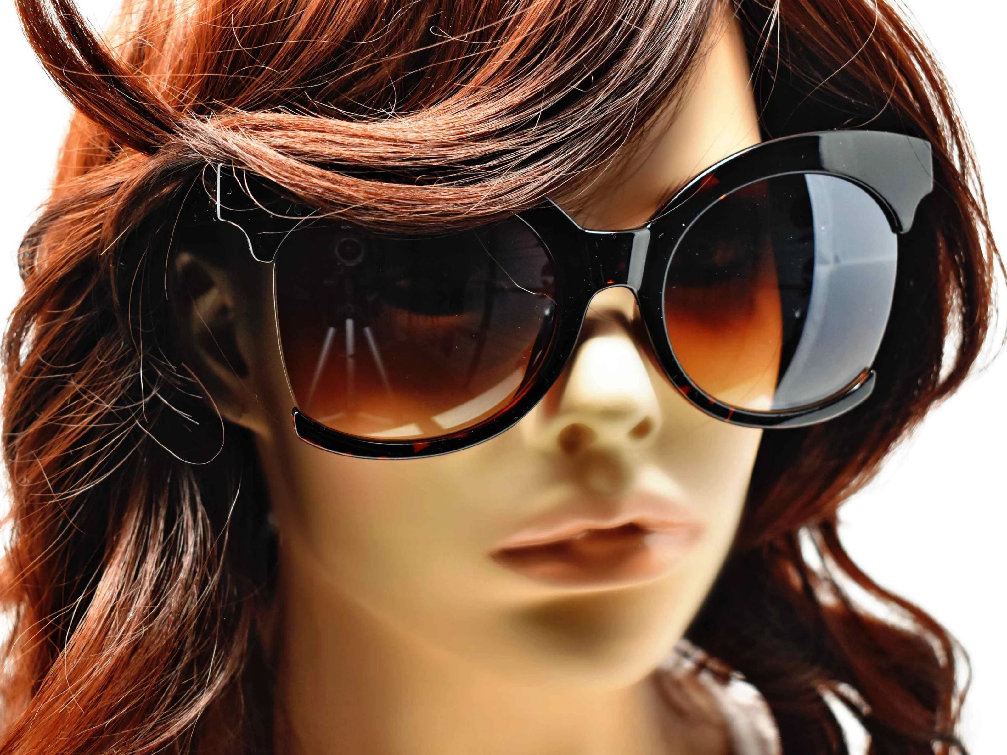 Be bold in our cutting edge primrose leopard tortoise cut out frames with a brown lens. 