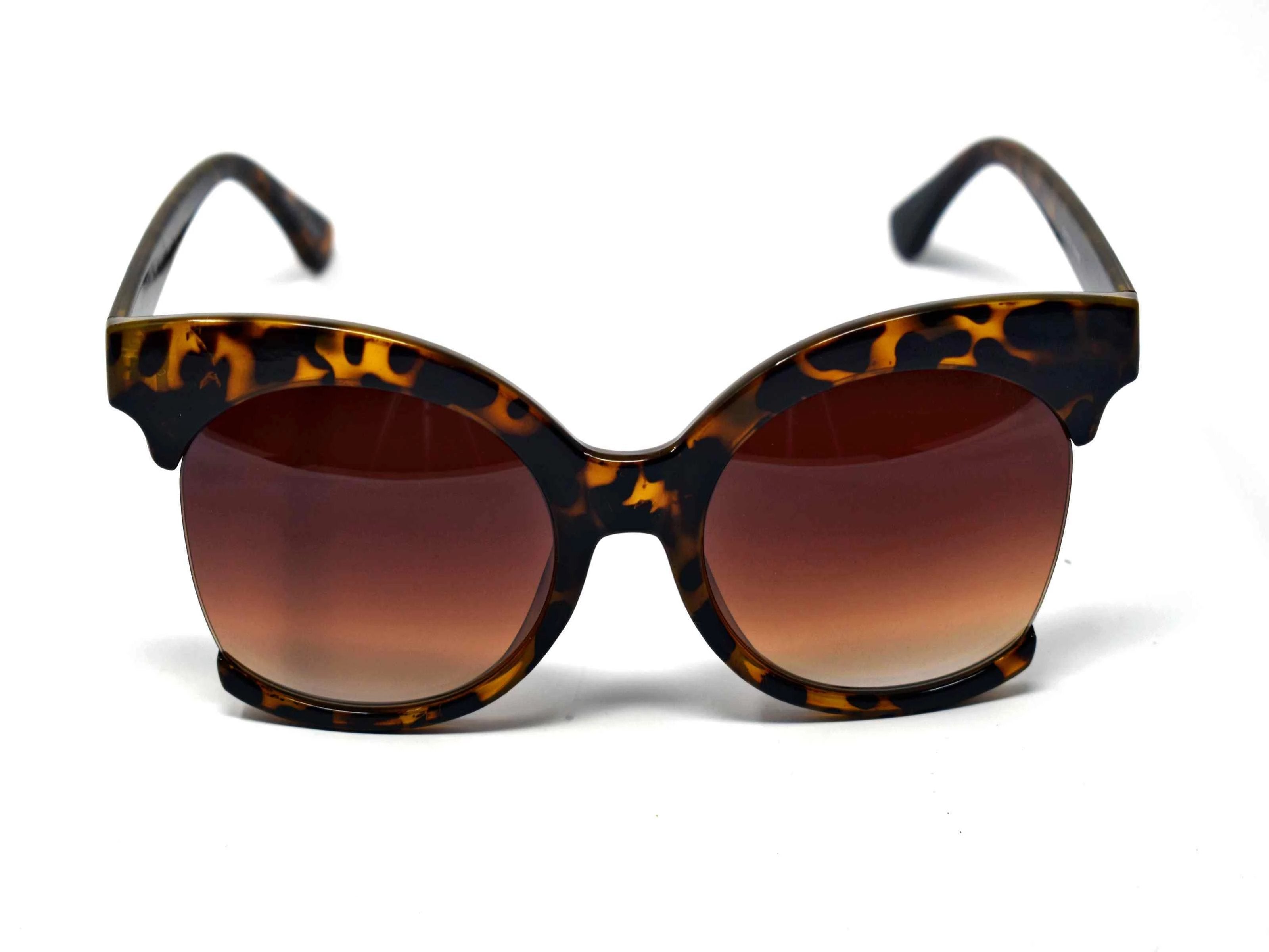 Be bold in our cutting edge primrose light leopard tortoise cut out frames with a brown lens. 