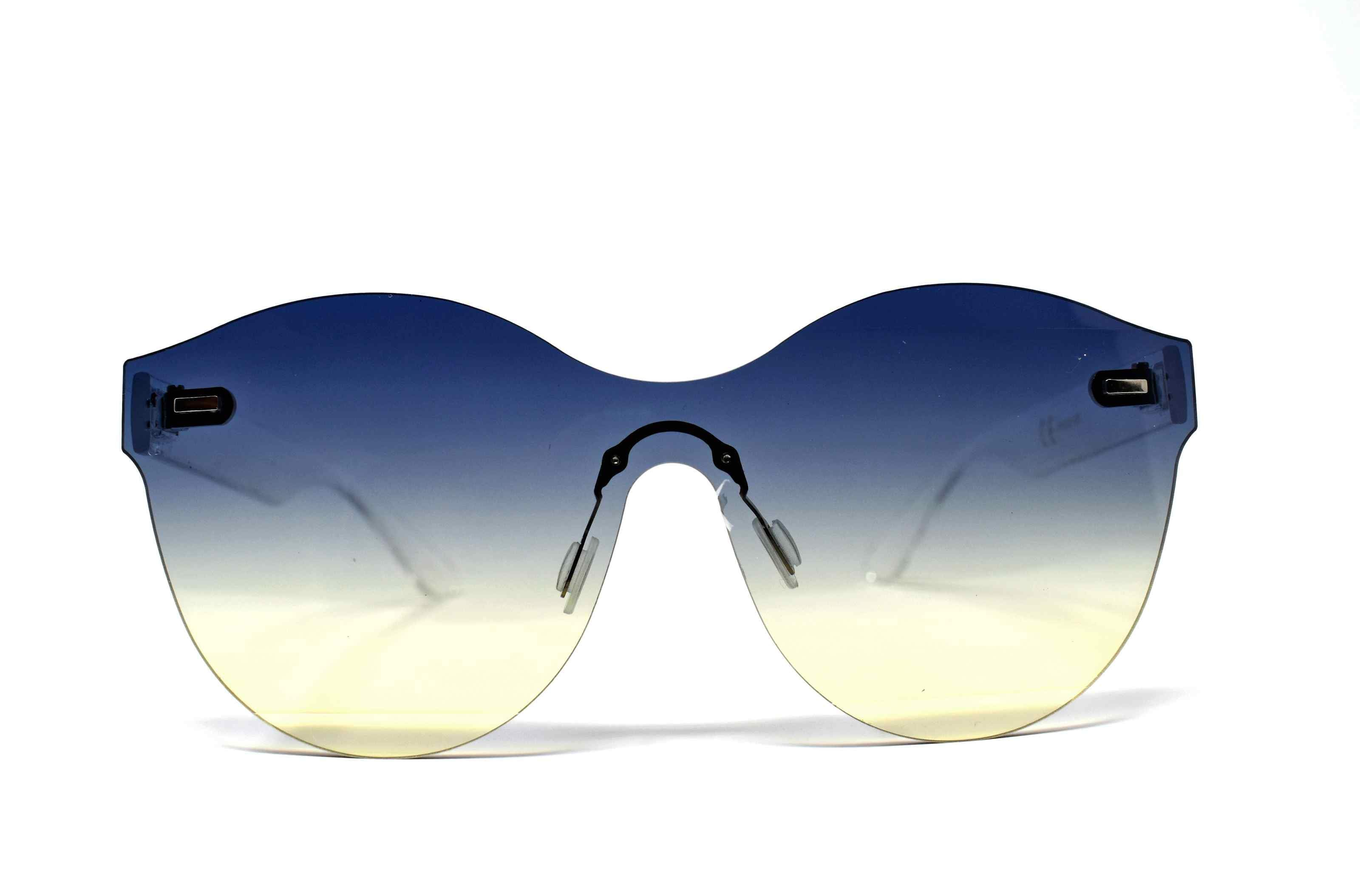 Its just a good vibe in these sage no rim sunglass frames with a blue to cream ombre lens.
