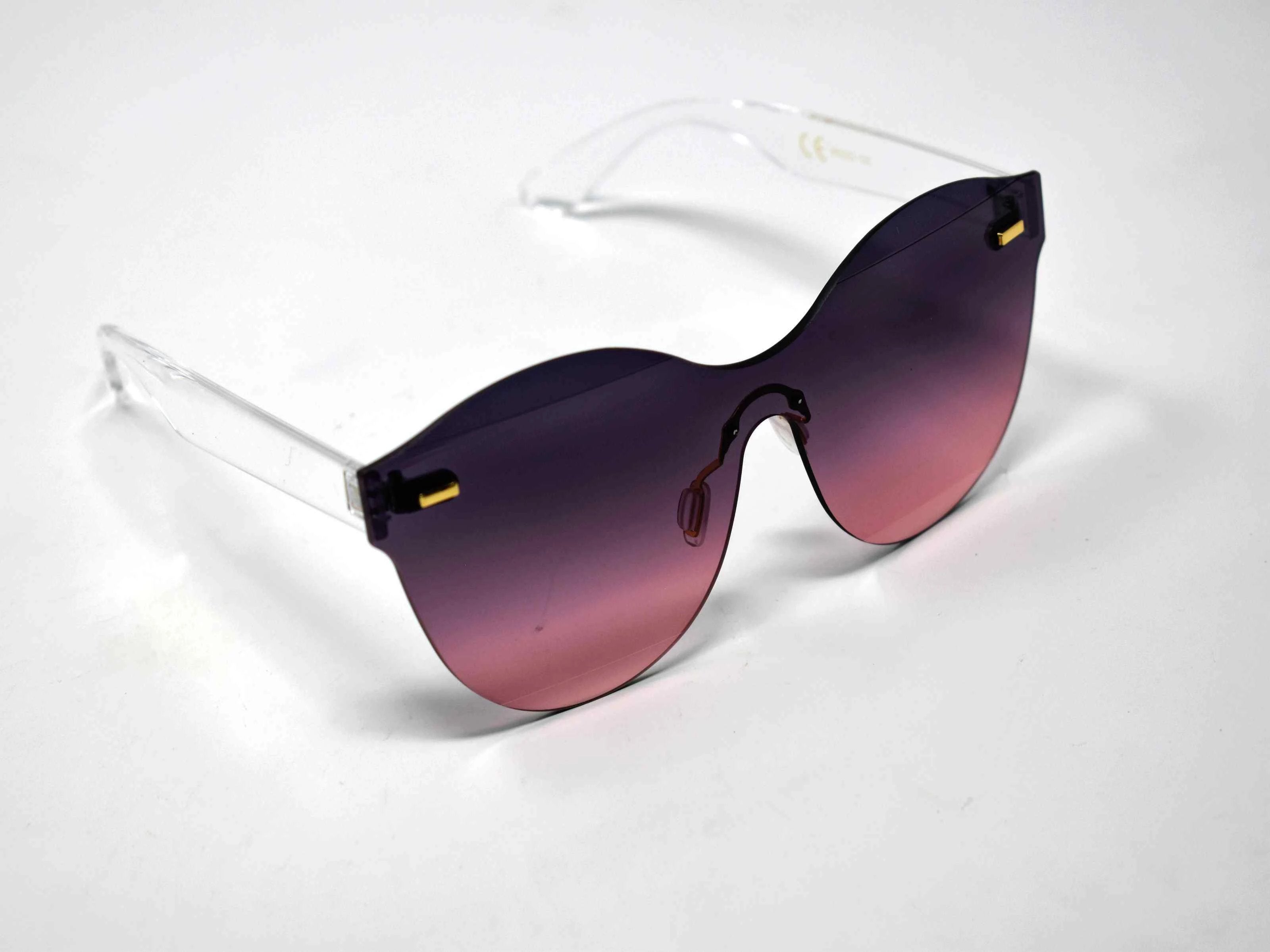 Its just a good vibe in these sage no rim sunglass frames with a plum to pink ombre lens.