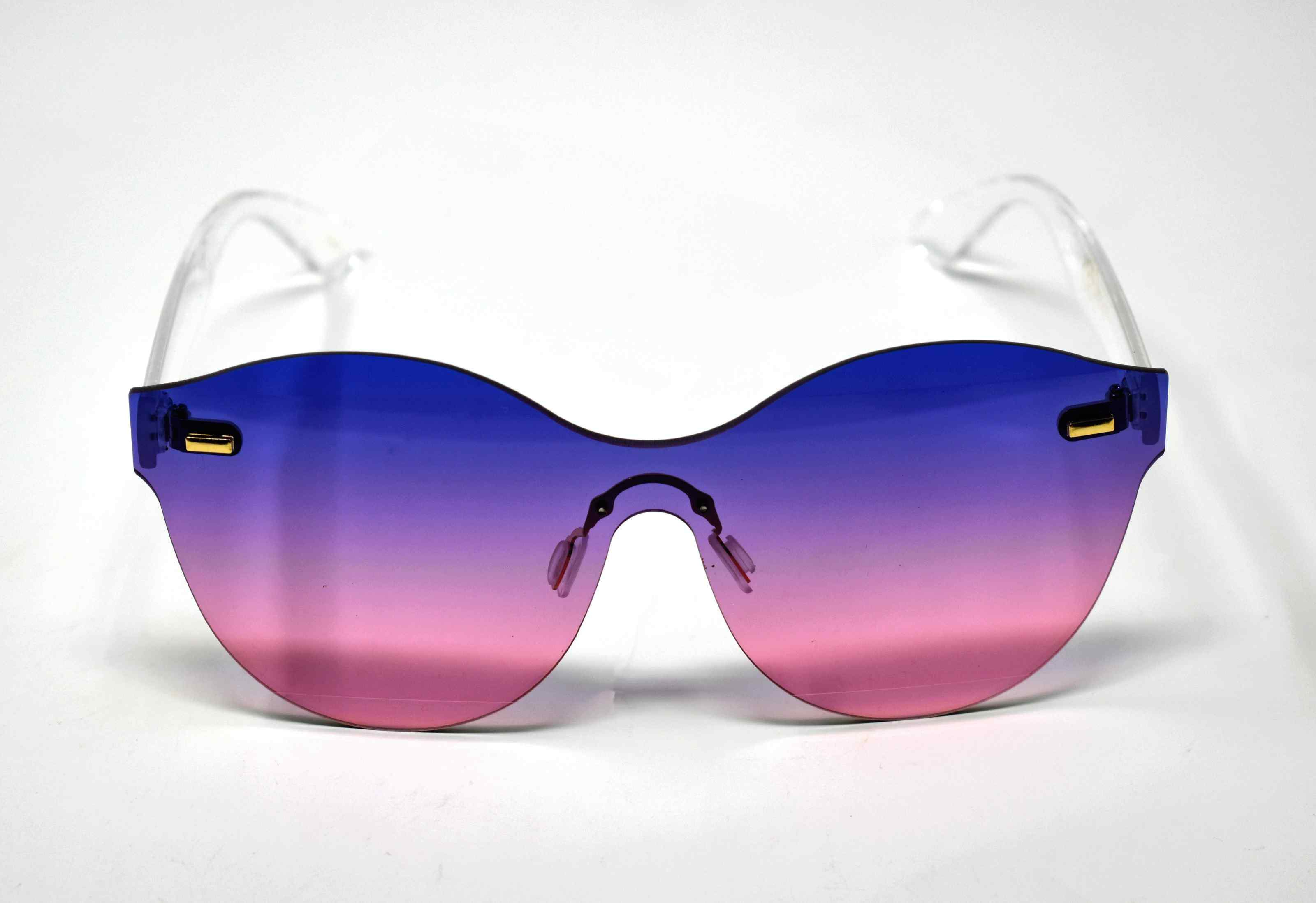 Its just a good vibe in these sage no rim sunglass frames with a purple to pink ombre lens.