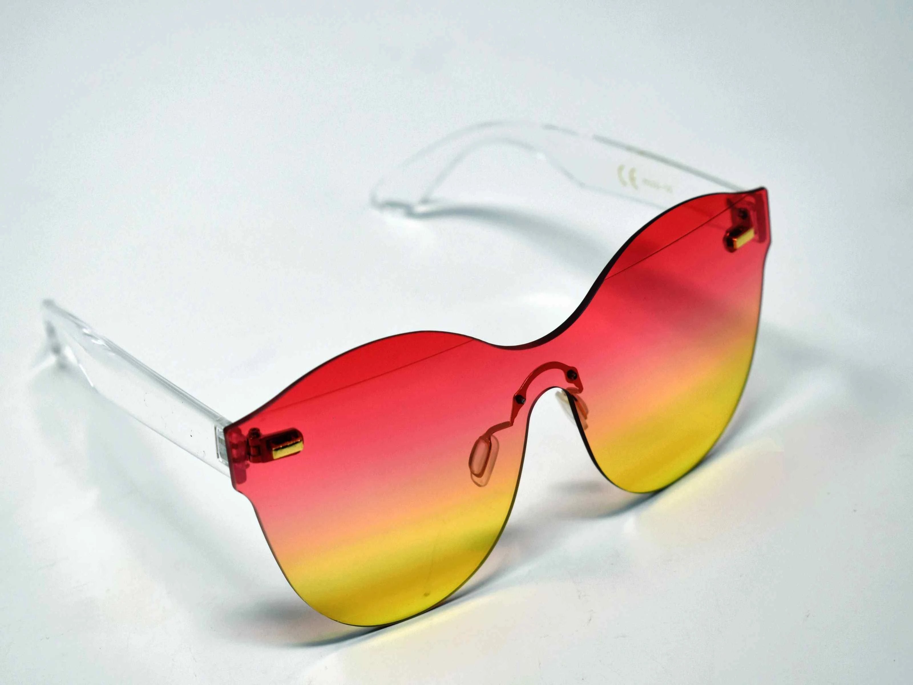 Its just a good vibe in these sage no rim sunglass frames with a rose pink to yellow ombre lens.