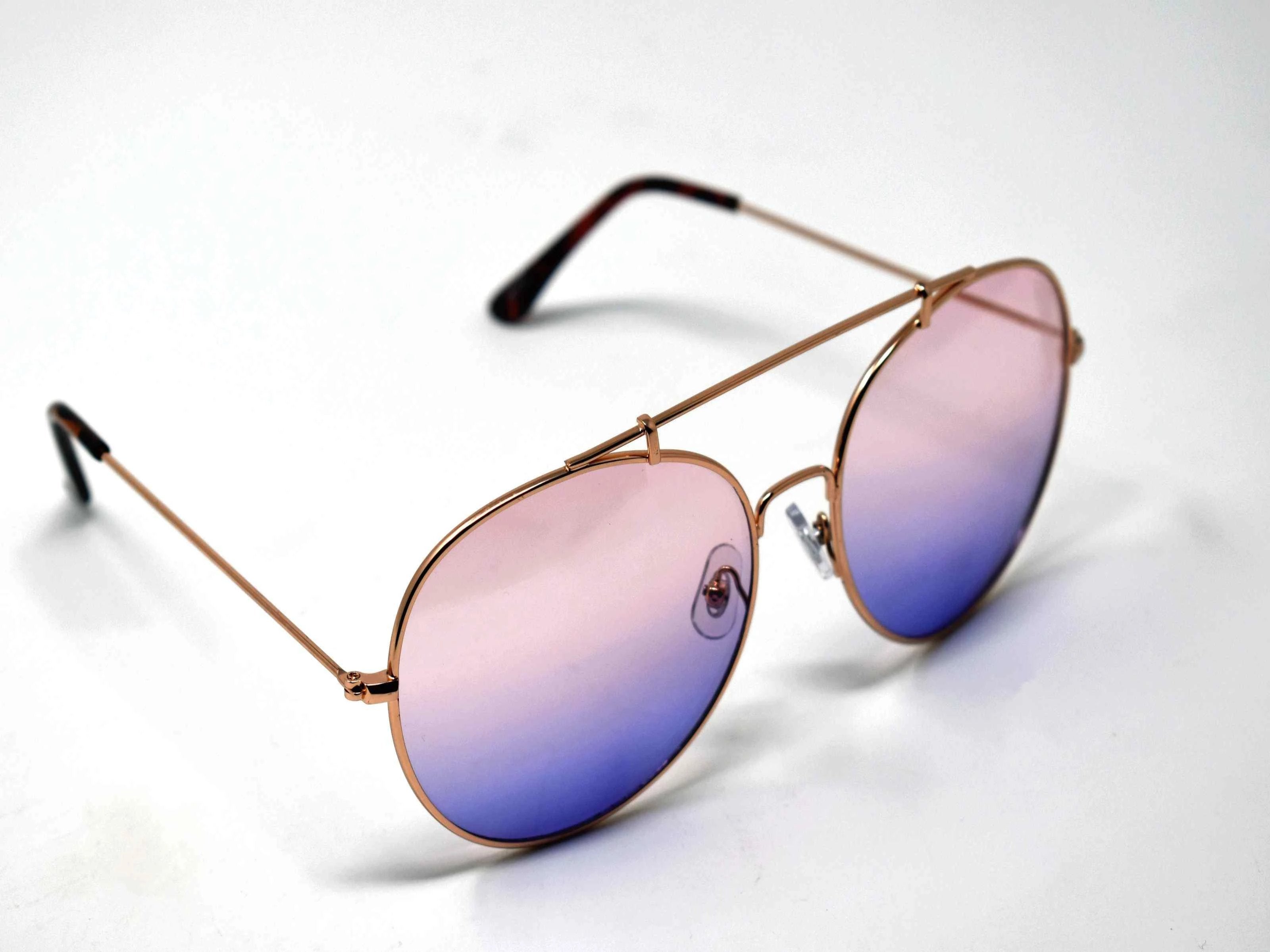 Va Va Voom will be consistently heard in these Vervain gold frame aviator Pink and Blue ombre lens sunglasses.