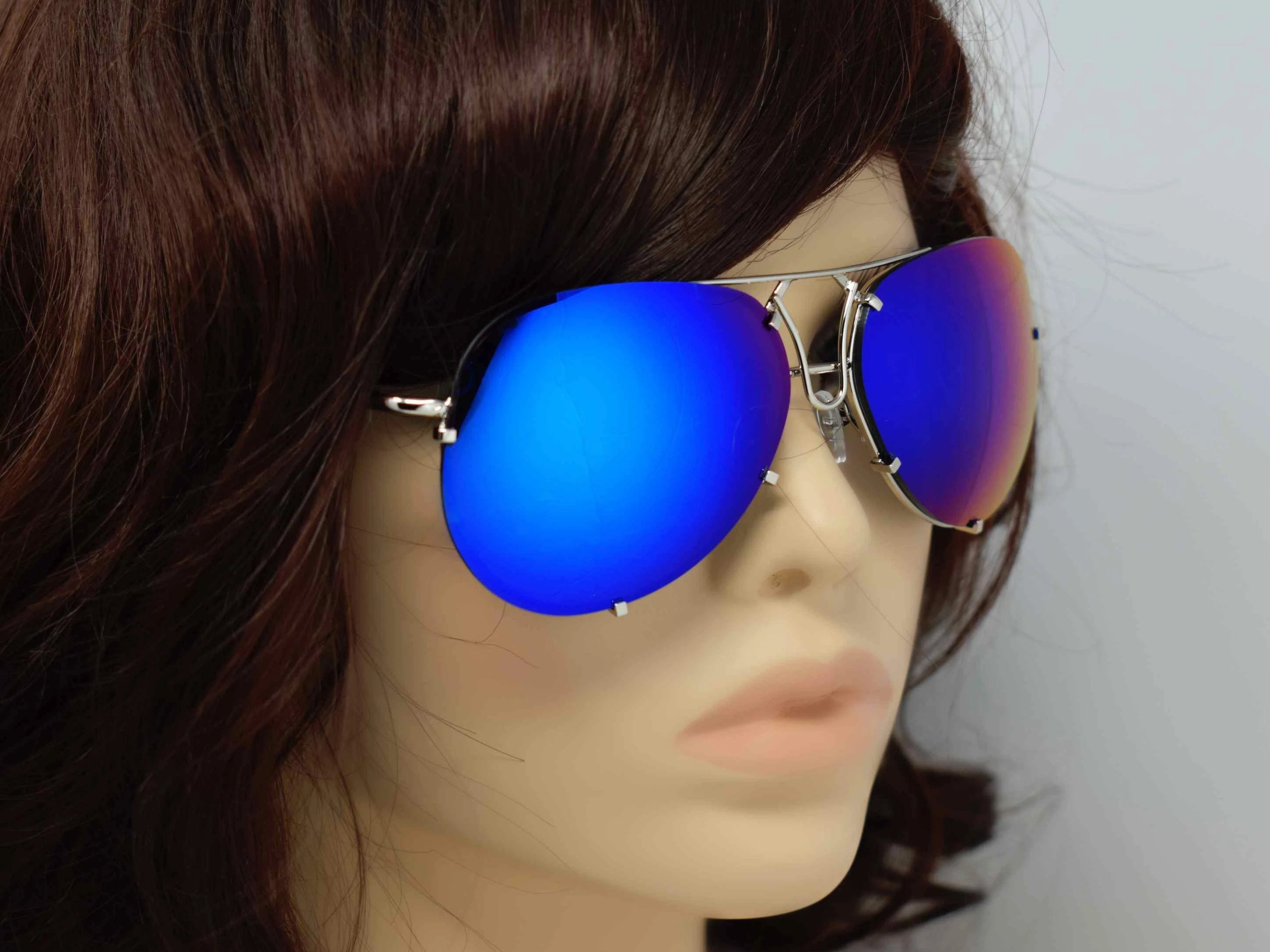 Don't get caught without these yarrow silver frame royal blue mirrored lens aviator sunglasses.